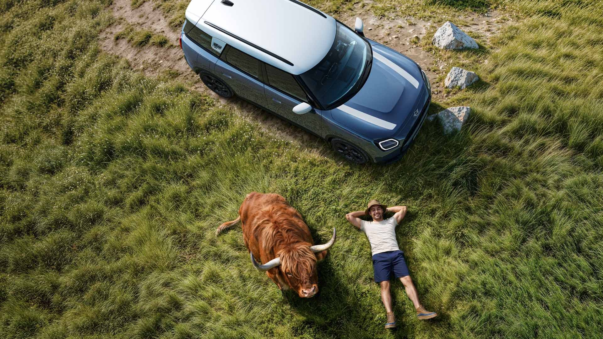 Man sitting in a MINI contacting Roadside Assistance